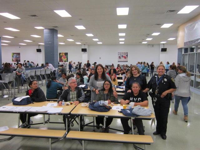 officer diaz with UCHS parent liaisons and parent 