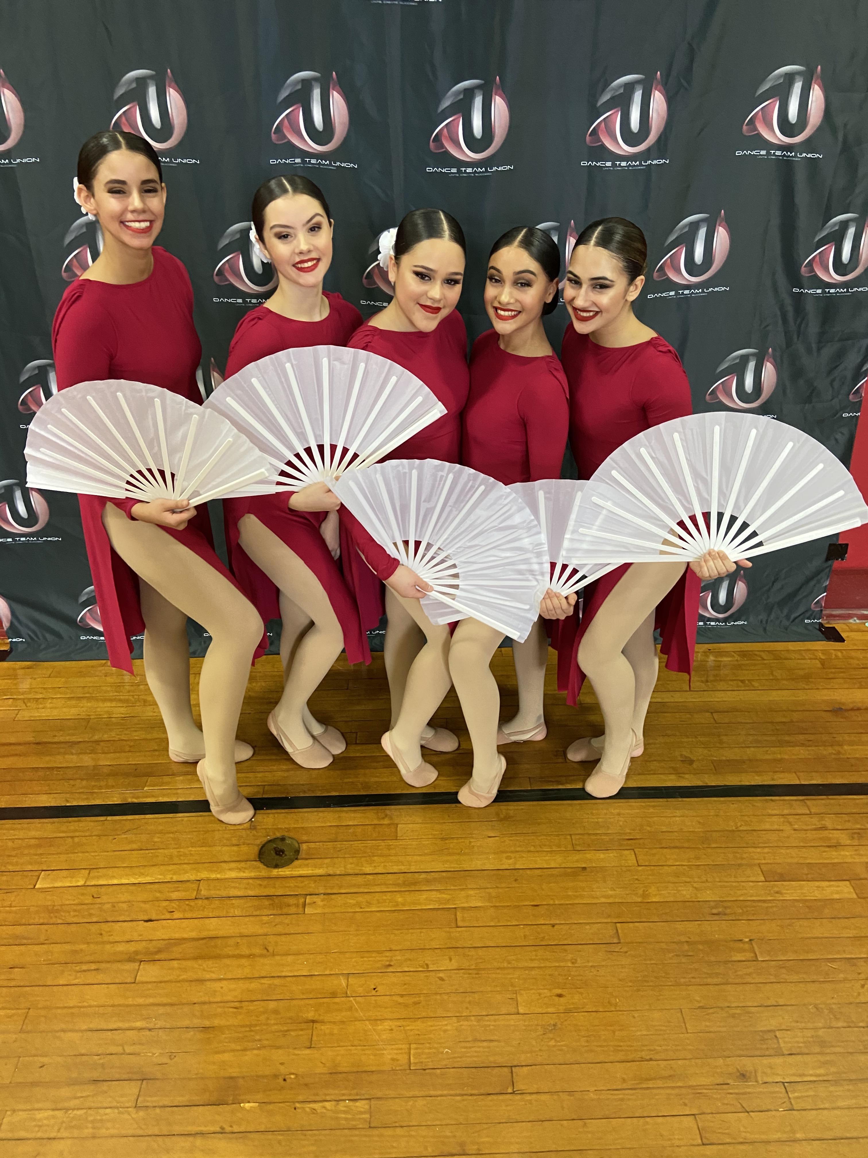 drillettes dance team in flamenco inspired costumes